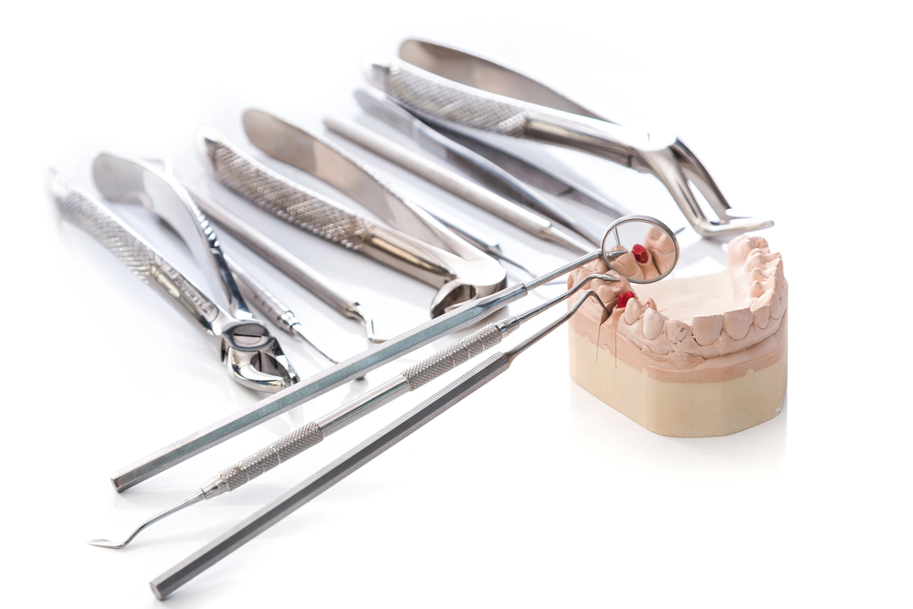Gypsum model of jaws and  different dental tools