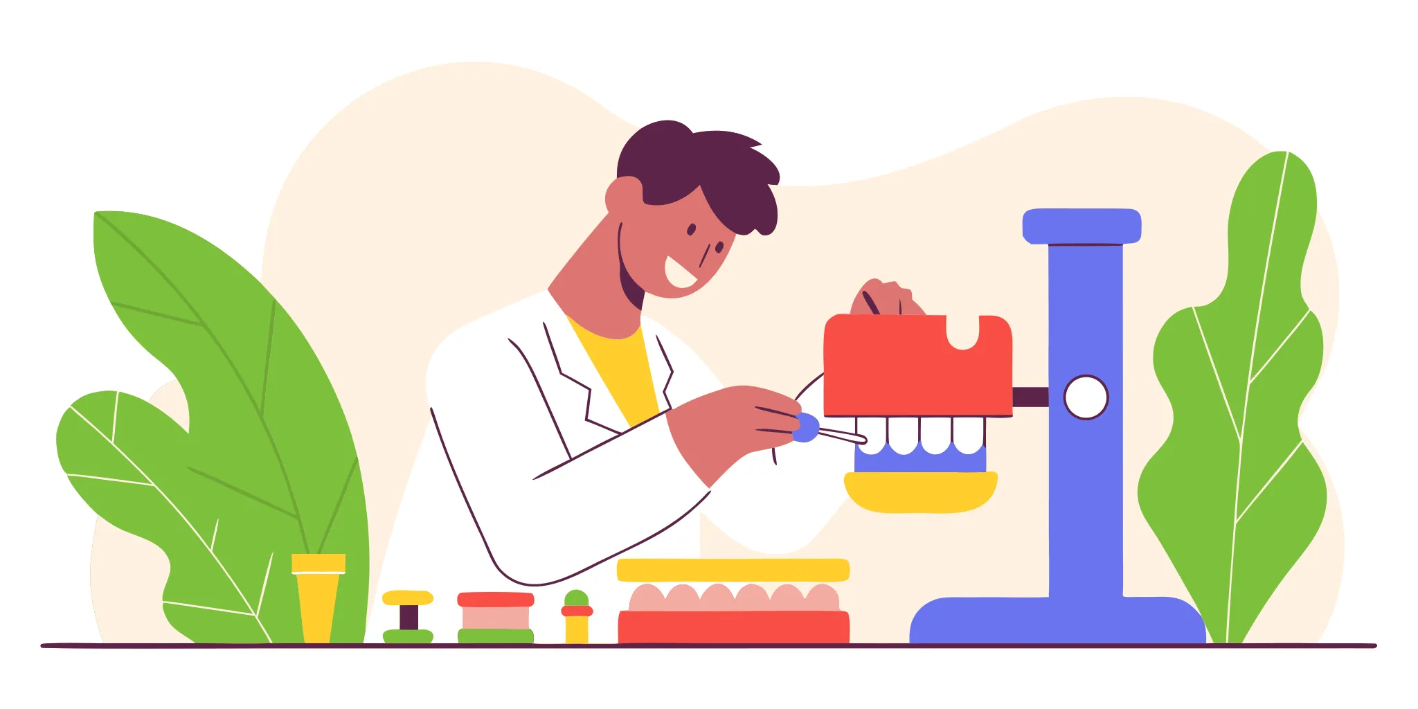Dental laboratory workbench with RPD framework material samples including cobalt-chrome, titanium, and PEEK